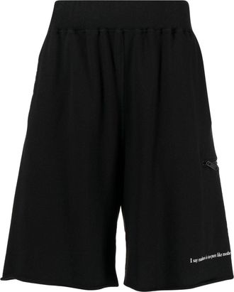 Undercover slogan-print cotton track shorts - men - Cotton - 1 - Black