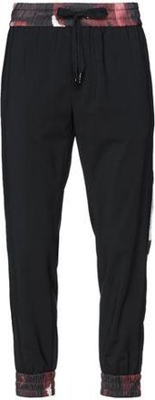 Dolce & Gabbana PARTES DE ABAJO - Pantalones en YOOX.COM