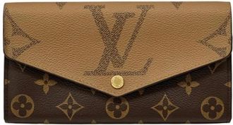Louis Vuitton Pre-owned Vintage Lange portemonnee (bi-fold) - Dames - Vintage Accessoires - Bruin - ONE Size - Vintage