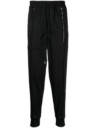 MASTERMIND WORLD logo-print drawstring track pants - men - Polyester - L - Black