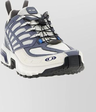 Salomon performance gtx sneakers featuring mesh panels