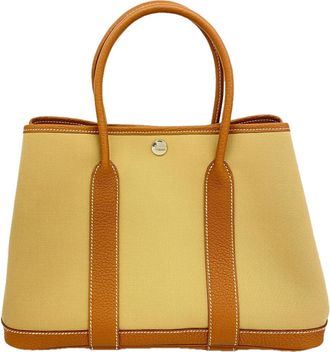 Herm&egrave;s Gold Toile Officier Tote Bag (Pre-Owned)