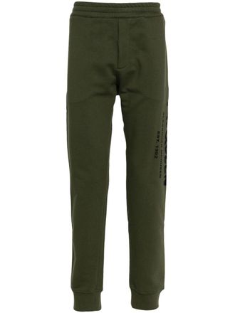 Alexander McQueen Pantaloni sportivi con stampa - Verde