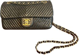 Chanel black lambskin leather chevron quilted small flap bag