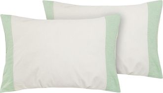 Puro Lino Pair of pillowcases with shuttlecocks in natural linen blend with delicate green edges