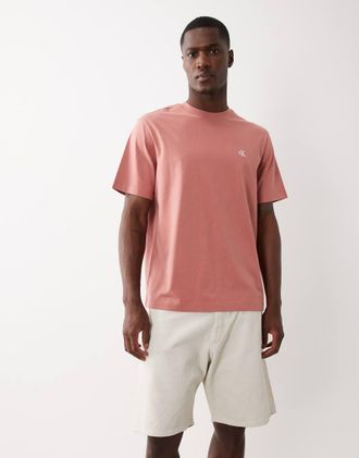 Calvin Klein Jeans T-shirt rosso chiaro con monogramma
