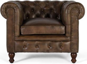 Giner&Colomer Sillón chester fabircado el piel con acabado capitoné