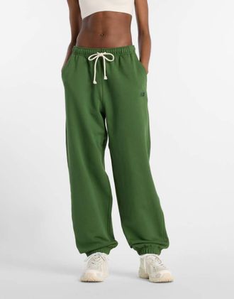 New Balance Athletics - Joggers in spugna verde scuro alpino