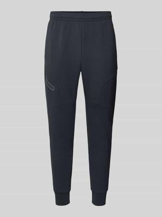 Under Armour Sweatpants mit Logo Modell Unstoppable in Black, Gr&ouml;&szlig;e XXL
