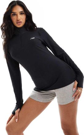 New Balance Top tecnico con zip corta nero