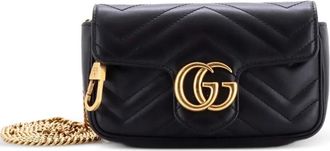 Gucci Borsa a tracolla GG Marmont super mini in pelle matelass&egrave; con battente - Nero