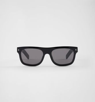 Prada Sunglasses with the iconic metal plaque