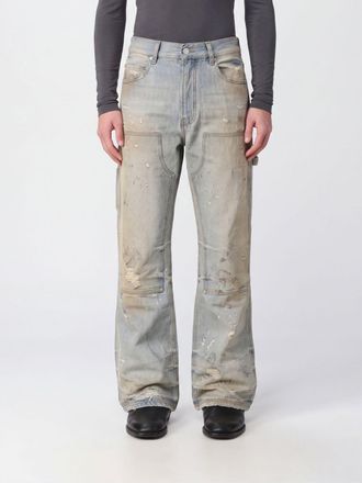 Amiri Jeans flared in denim distressed blu a vita media