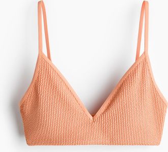 H&M Wattiertes Bikinitop - Hellorange