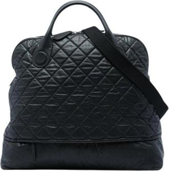 Chanel Pre-owned Quilted Coated Canvas Travel Bag - Dames - Vintage Shopper - Zwart - ONE Size - Leer - Vintage