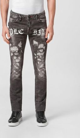 Philipp Plein Jeans skinny in denim distressed con stampa logo all-over