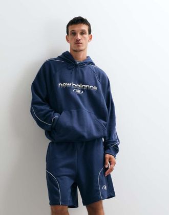New Balance felpa con cappuccio Trackside in french terry blu navy