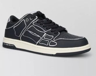 Amiri low top sneakers perforated toe box rubber sole