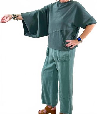 Xcvi Asymmetrical Ribbed Knit Statement Top In Emerald