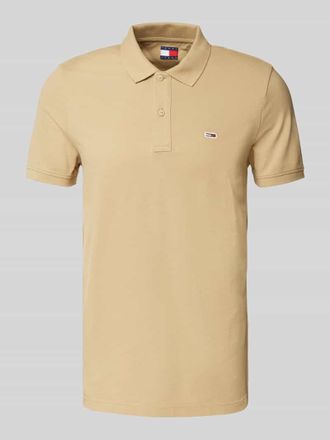 Tommy Jeans Slim Fit Poloshirt mit Logo-Stitching in Beige, Größe XL