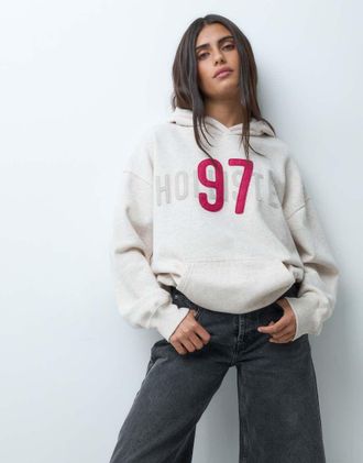 Hollister felpa con cappuccio oversize con logo grafico color avena-Rosso