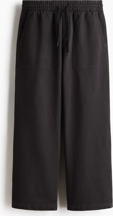 H&M Joggpants aus Baumwolle in Relaxed Fit - Schwarz