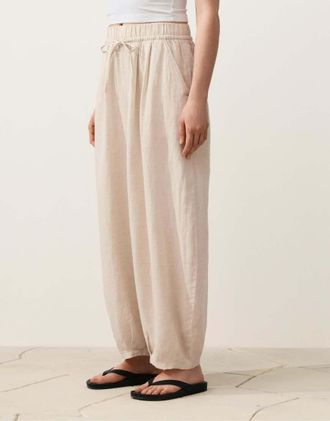 Oysho Pantaloni a palloncino a pieghe in 100% lino color sabbia m&eacute;lange-Neutro