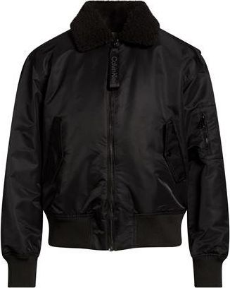 Calvin Klein ROPA DE ABRIGO - Plum&iacute;feros y acolchados en YOOX.COM
