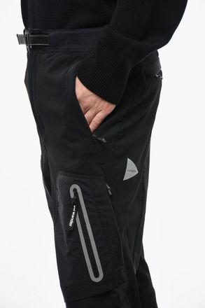 And Wander Pantaloni STRETCH SHELL Termici con Tasche a Zip And Wander