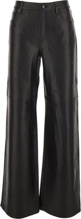 Michael Kors Zwarte leren broek met riemlussen - Dames - Wijde Broeken - Zwart - XS - Broeken