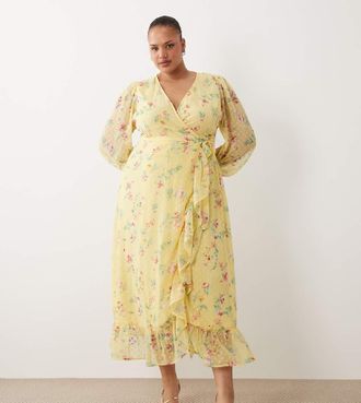 Vila VILA Curve - Vestito lungo a portafoglio plumetis giallo con stampa a fiori e volant