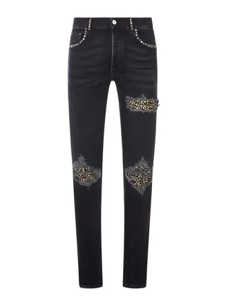 Amiri Skinny Jeans With Studs And Destroy Details