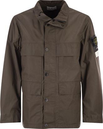Stone Island veldjas met gepigmenteerde wascoating