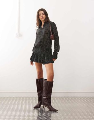 Lioness Girls - Vestito camicia corto stretto in vita nero a pois con bottoni sul davanti e gonna con volant