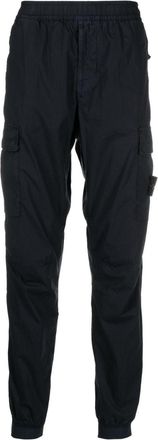 Stone Island Compass-appliqu&eacute; tapered cargo trousers - men - Cotton/Spandex/Elastane - 31 - Blue