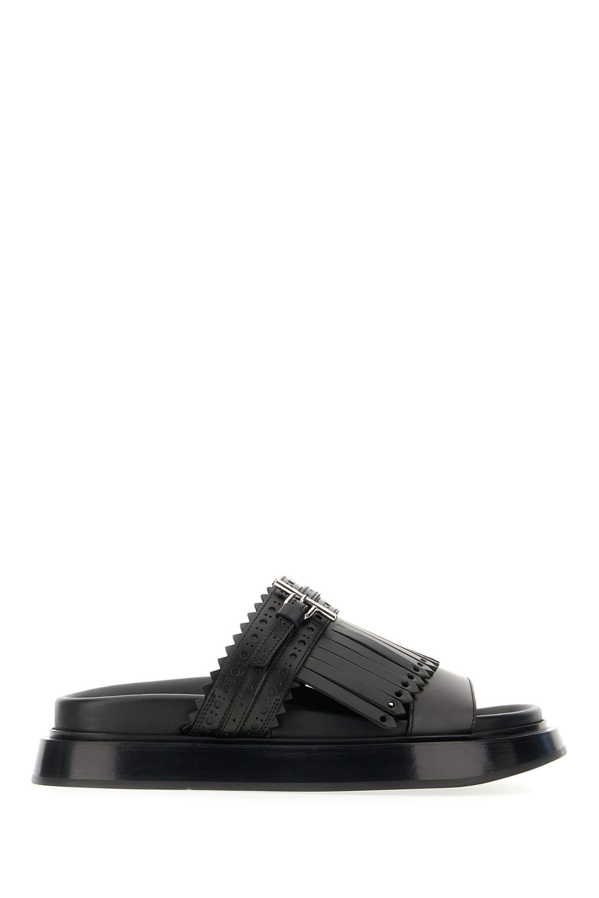 サンダル ALEXANDER MCQUEEN  Slippers and Clogs Men Leather Black Alexander McQueen Arc Clogs | Black | FARFETCH