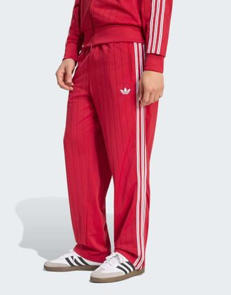 adidas Originals pantaloni della tuta Firebird drop needle in rosso team victory