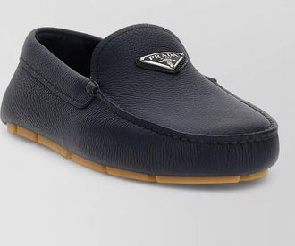 Prada hammered leather driver loafers textured sole