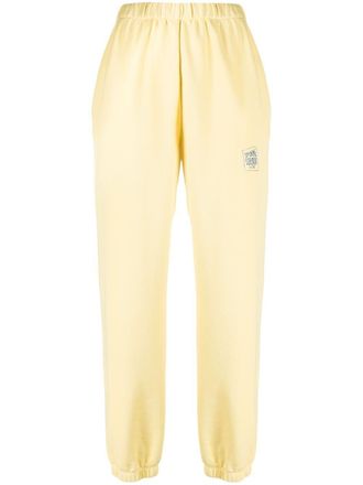 Opening Ceremony warped logo-print track pants - women - Cotton - M - Yellow