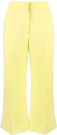 Pucci pressed-crease flared trousers - women - Viscose - 44 - Yellow