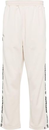 Aape By A Bathing Ape logo-embroidered track pants - men - Polyester - S - Neutrals