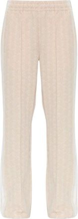 Lacoste Pantalones de ch&aacute;ndal acampanados con monograma - Trousers - Mujer - Beige - XS
