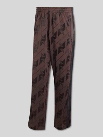 adidas Originals Relaxed Fit Sweathose mit Allover-Logo-Print in Dunkelbraun, Gr&ouml;&szlig;e XXL
