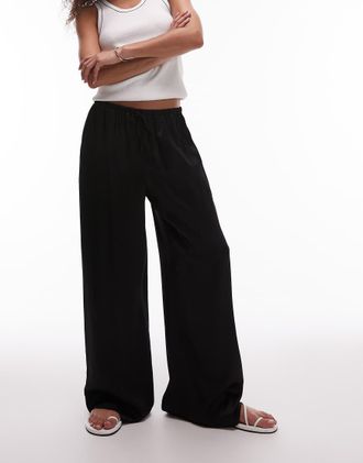 Topshop Pantaloni a fondo ampio neri in raso allacciati in vita-Nero