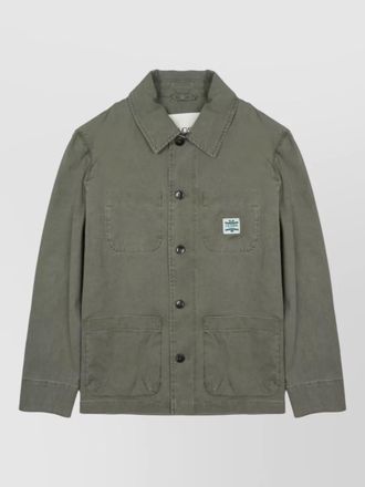Closed long coat patch pockets detail