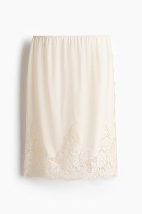 H&M Viskosejupe mit Spitze - Cremefarben