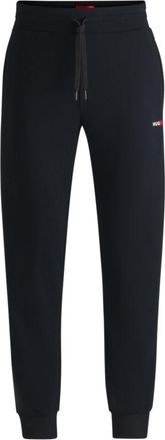 HUGO BOSS tracksuit bottoms with heart logo