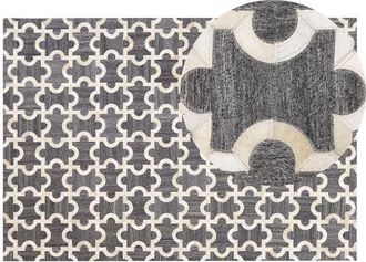 Beliani Beliani - Area Rug Grey Jacquard Beige Cowhide Leather 140 x 200 cm Yedisu