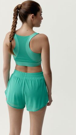 Born Living Yoga Top Padma 2.0 Miami Green