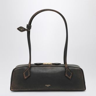 Alaia Le Teckel medium bag in aged leather